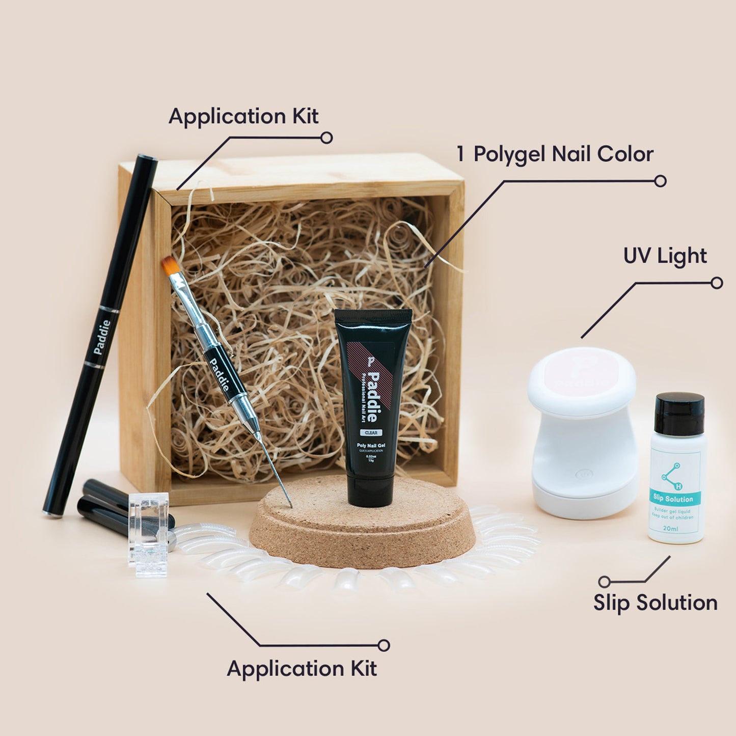 Polygel nail kit with essentials for DIY polygel nails. Includes 15g/0.5 oz polygel tube, 20 nail tips, nail clip, brush + cuticle pusher, slip solution, instructions booklet, free UV light.